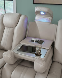 Elevate Edges Reclining Sofa with Drop Down Table