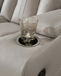 Elevate Edges Reclining Sofa with Drop Down Table