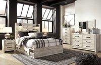 Cambeck Queen Panel Storage Bed, Dresser, Mirror, 2 Chests and 2 Nightstands