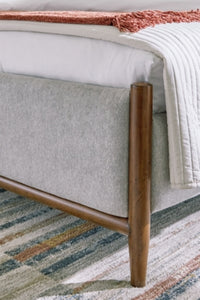 Lyncott Queen Upholstered Bed, Dresser, Mirror and Nightstand