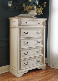 Realyn King Storage Bed, Dresser, Chest and 2 Nightstands