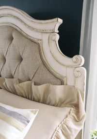 Realyn Queen Upholstery Panel Bed, Dresser, Chest, Nightstand, and Vanity Set