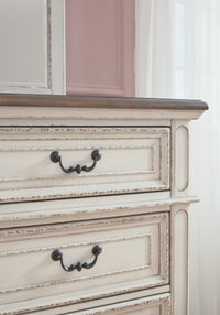 Realyn Queen Upholstery Panel Bed, Dresser, Chest, Nightstand, and Vanity Set