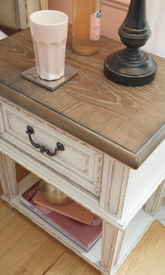 Realyn Queen Upholstery Panel Bed, Dresser, Chest, Nightstand, and Vanity Set